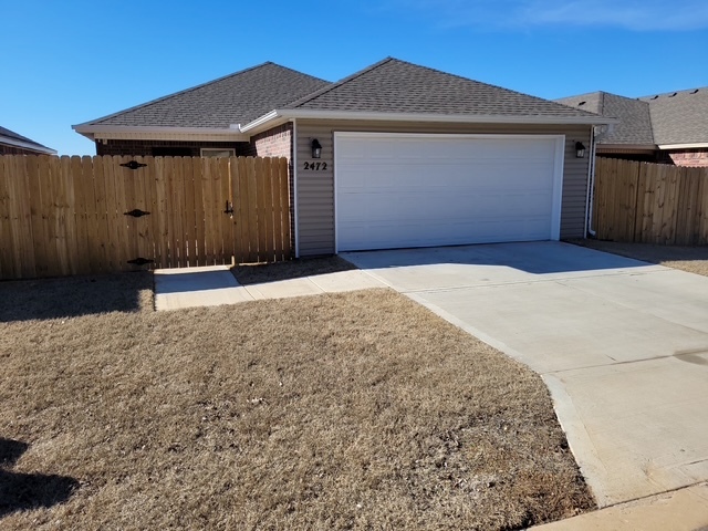 Awesome rear load garage off private alleyway. Privacy fenced small yard. - 2472 N Raven Ln