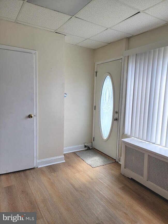 Building Photo - 7009 Elmwood Ave