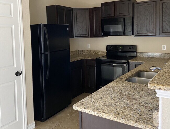 Foto del edificio - "Spacious 3-Bed Condo with Granite Countertops & 2.5 Baths in Prime San Antonio Location!"