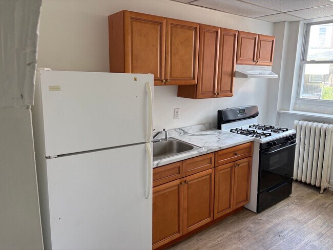 Building Photo - 5617 W Girard Ave