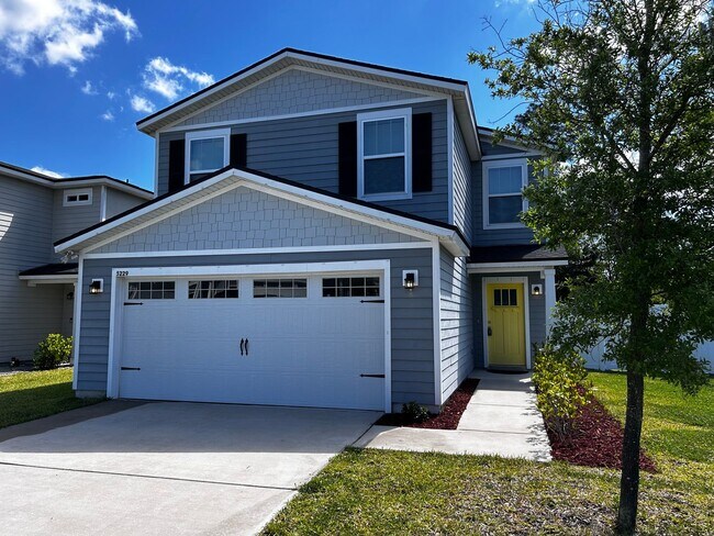 Building Photo - Charming, newer construction, 3 bedroom 2.5 bath home with Fenced In Yard and 2 car garage! Pest ...