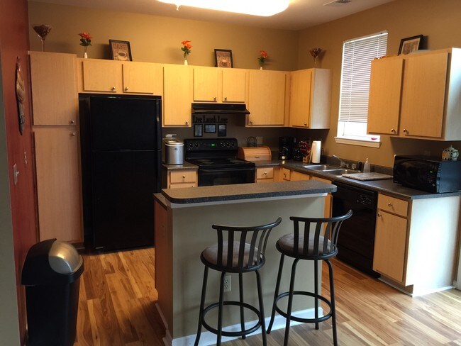 Foto del edificio - 721 Woodland Creek Way