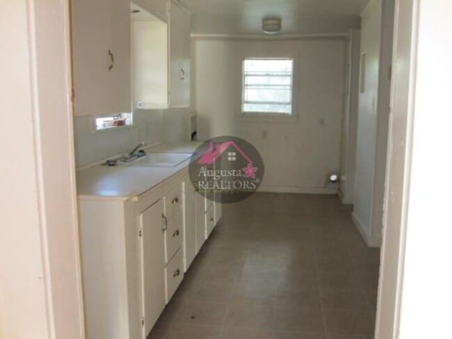 Building Photo - Three