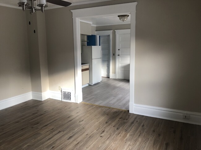 Living room looking into kitchen - 920 S 5th St