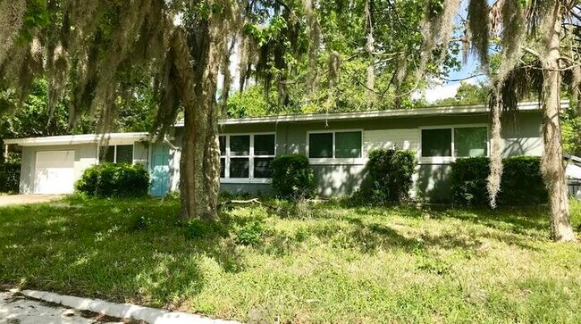 Building Photo - Spacious 4 Bedroom Home With Garage And Modern Updates