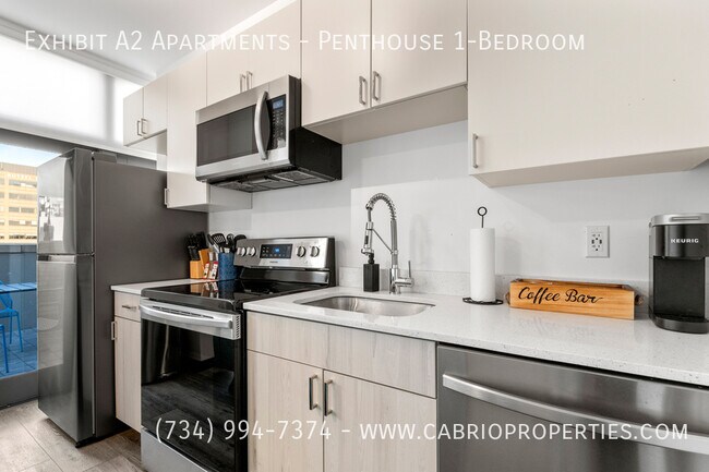 Building Photo - Exhibit A2 Apartments-Penthouse 1-Bedroom