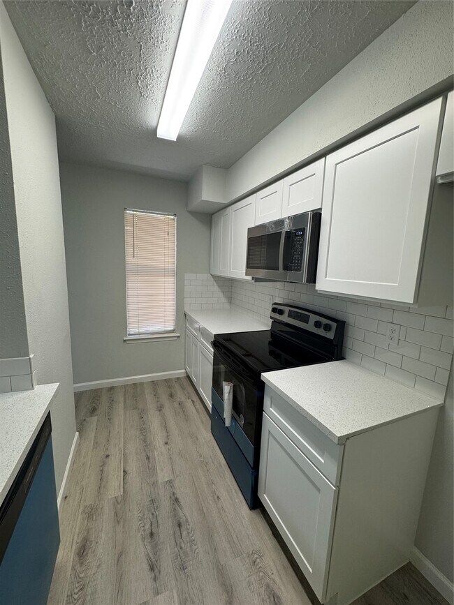 Foto del edificio - 10555 Turtlewood Ct