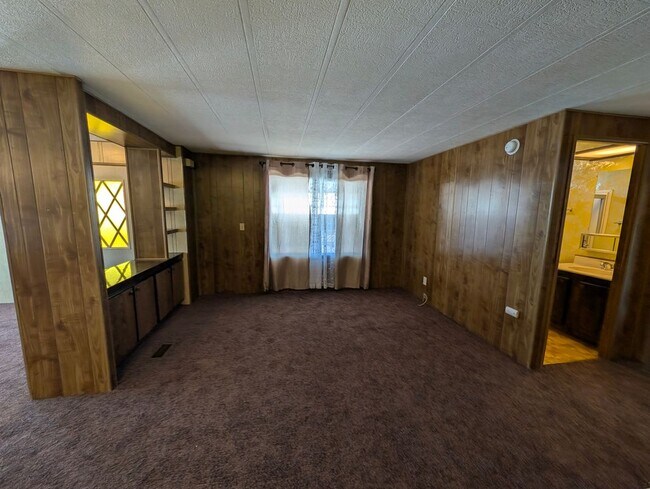 Building Photo - 26108 Fountain Palm Dr