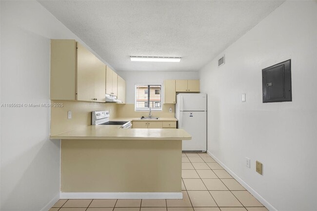 Building Photo - 6165 W 22nd Ct