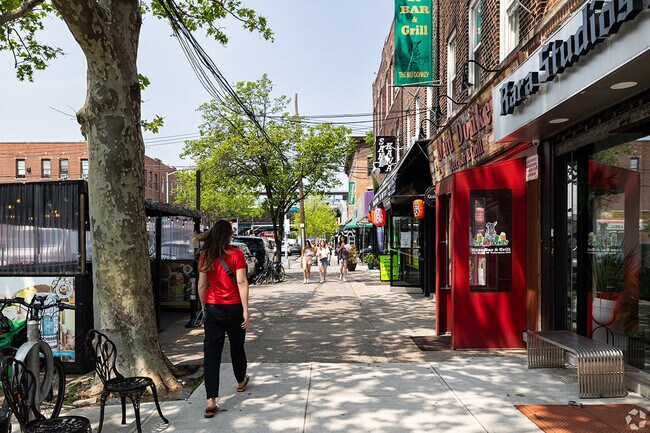 Residents frequent local businesses in Long Island City.