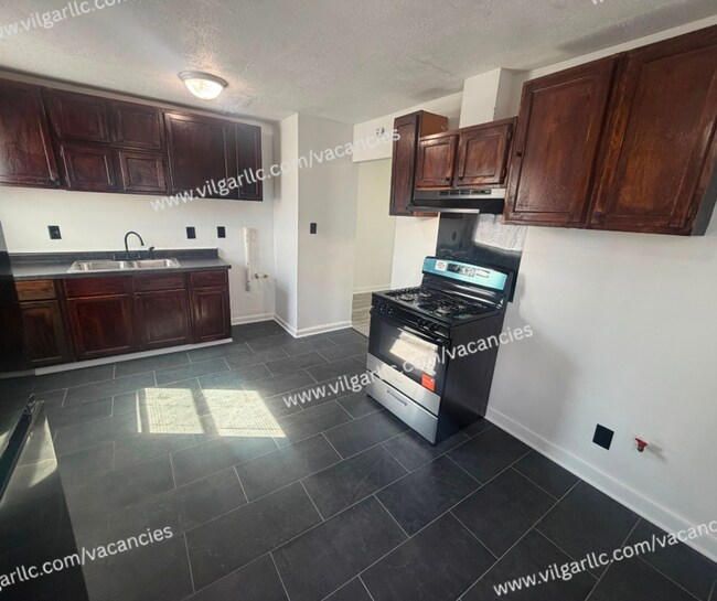 Foto del edificio - 5121 E 10th Ave