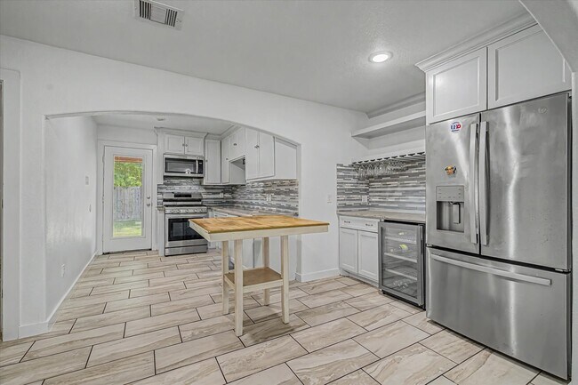 Foto del edificio - 8159 Glenhollow Dr
