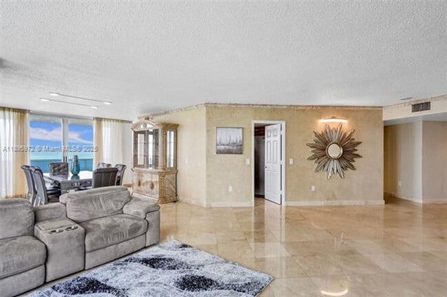 Building Photo - 16711 Collins Ave