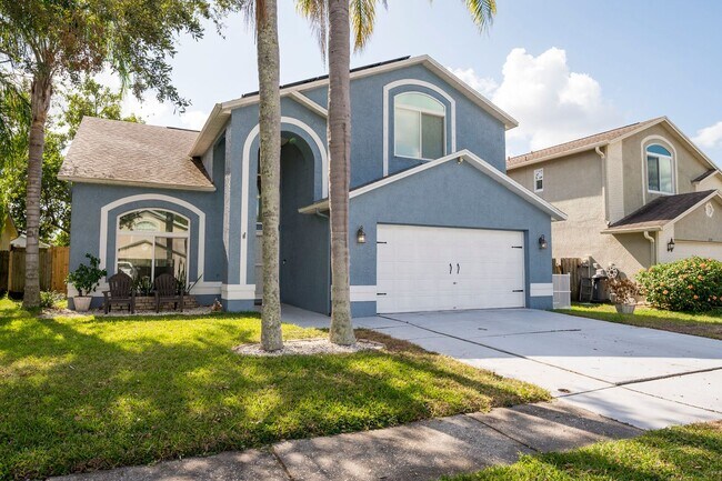 Foto del edificio - STUNNING 4-BED, 3-BATH HOME WITH SOLAR PANELS IN TAMPA, FL!