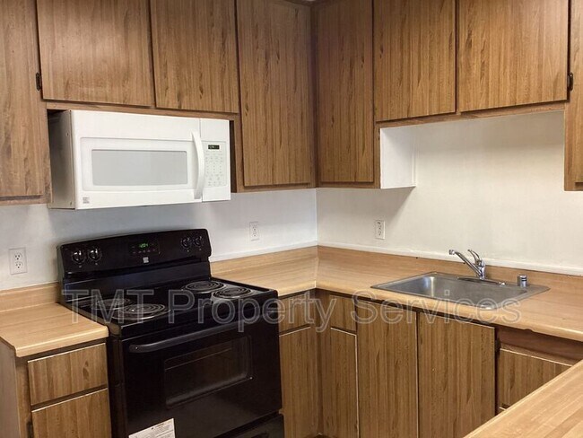 Foto del edificio - 7847 Orchard Woods Cir