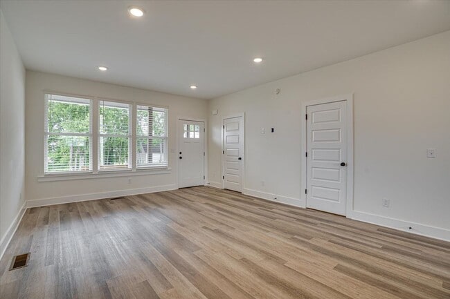 Building Photo - 2022 Construction 4 bedroom townhome close...