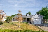 Primary Photo - Charming Brick Corner Home with Spacious L...