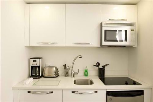 Foto del edificio - 445 W 41st St