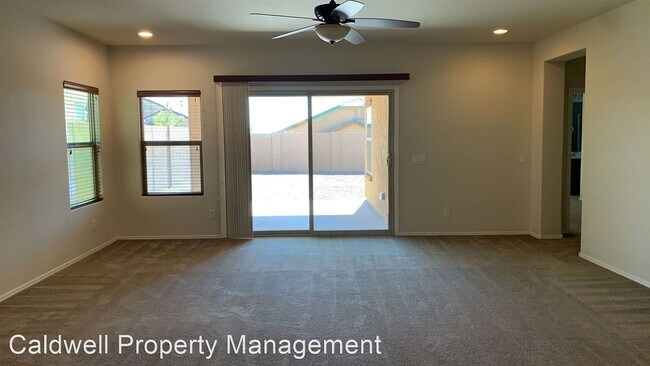 Building Photo - 3 br, 2.5 bath House - 11109 E. Travertine...