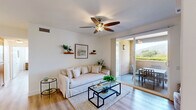 Located at 31001 Samantha Ln in Temecula, CA, this well-appointed single-story home offers 2 bedrooms and 3 bathrooms across a thoughtfully designed floor plan. Light-toned walls and durable wood-look flooring run throughout, creating a cohesive and airy atmosphere.

The kitchen is a functional centerpiece, featuring warm wood cabinetry, granite countertops, recessed lighting, black appliances, and a curved peninsula with an integrated sink — ideal for both cooking and casual dining. The adjacent dining area is defined by a chandelier overhead and a large herringbone-framed mirror that adds visual depth. The living room is bright and comfortable, with a ceiling fan and a neutral palette that invites relaxation.

The primary bedroom is generously sized, boasting a tray ceiling, large windows framing scenic outdoor views of the surrounding landscape, and light hardwood flooring. The second bedroom is equally inviting, filled with natural light from multiple windows. The three bathrooms are clean and well-finished, each featuring wood-toned vanities, tub-shower combinations, and tasteful shelf accents.

A covered outdoor patio completes the home, offering framed views of the mountains and surrounding greenery — a perfect setting for outdoor dining in the Southern California climate.