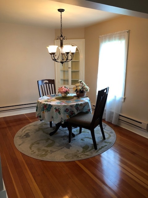 dining room with built-in corner cupboard - 2901 S Lake Ave