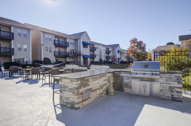 Building Photo - Quad Apartment Homes