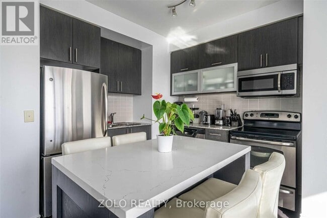 Building Photo - 28-2028 Ted Rogers Way
