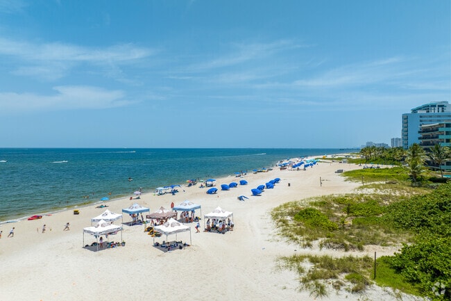 Extensive beaches with white sand surround Pompano Beach grace Pompano Beach coast.