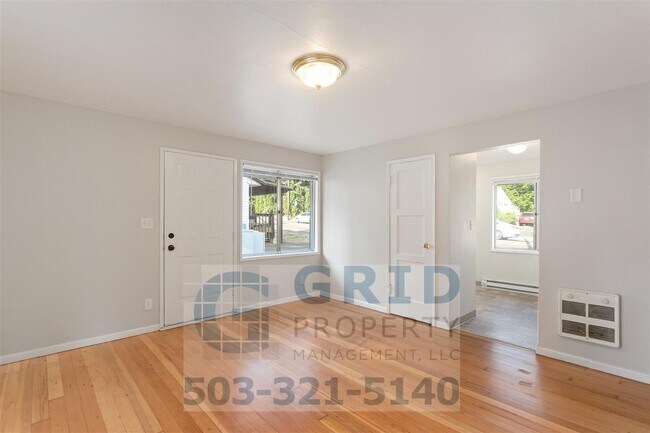 Building Photo - Charming 2BR House with Garage & Private Patio in Vancouver!