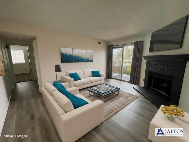 Photo - GORGEOUSLY REMODELED 2 bed 2 bath on 3rd floor with vaulted ceiling and skylight! Apartment