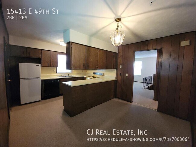 Foto del edificio - 15413 E 49th St