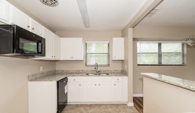 Building Photo - 7023 Cherbourg Ave N