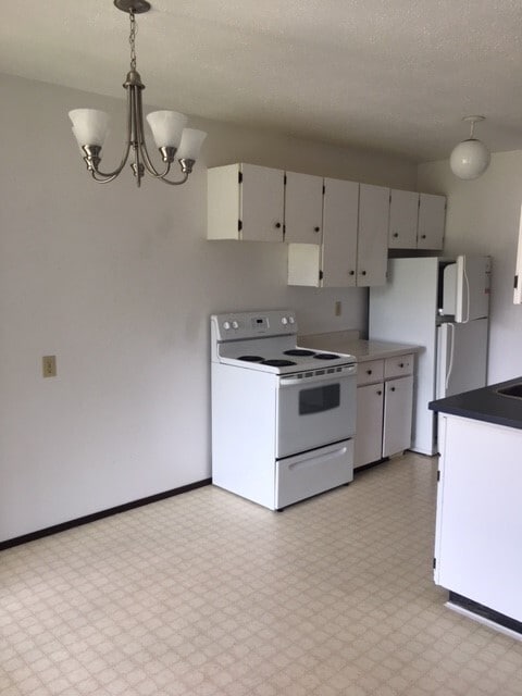 Building Photo - 3 Bed 1.5 Bath Unit in Olds, AB