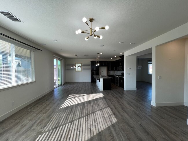 Building Photo - Beautiful 4 Bedroom Home With Low Maintenance Landscaping And Updated Interior