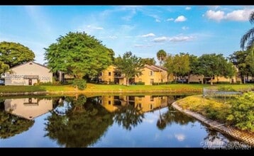 Building Photo - 3833 Cocoplum Cir