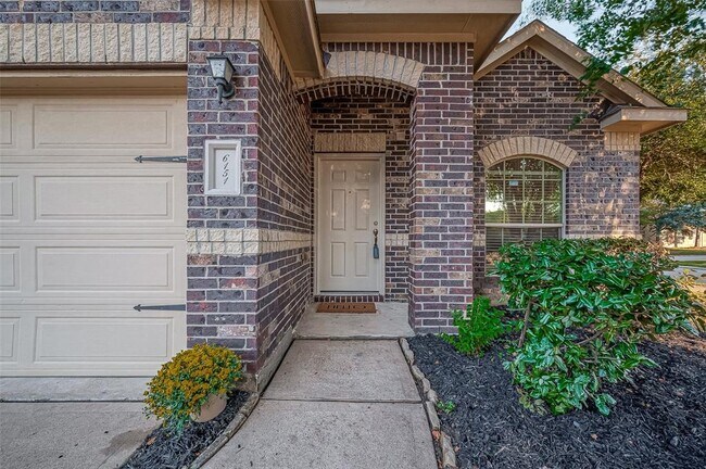 Foto del edificio - 6151 Grassy Haven Ln