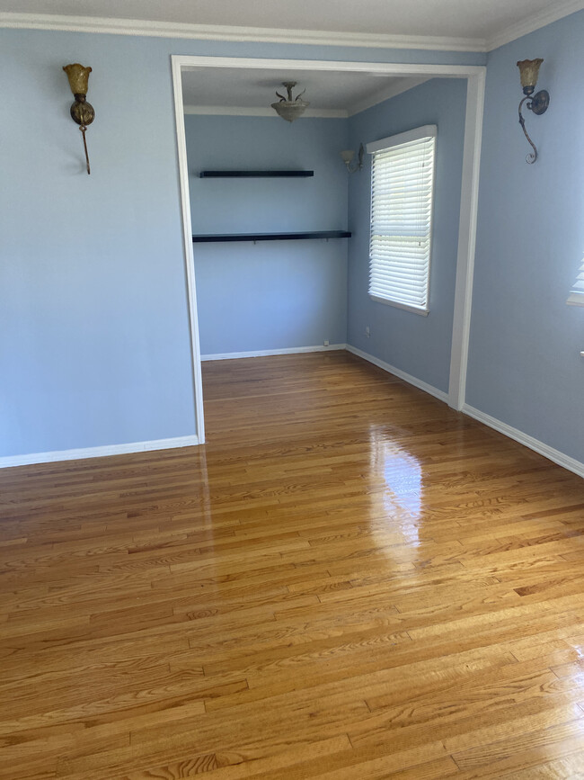 Dining area open to the living room creating a larger space. - 1857 Pandora Ave