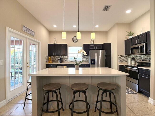 Building Photo - Pool Maintenance Included • Gated Community!