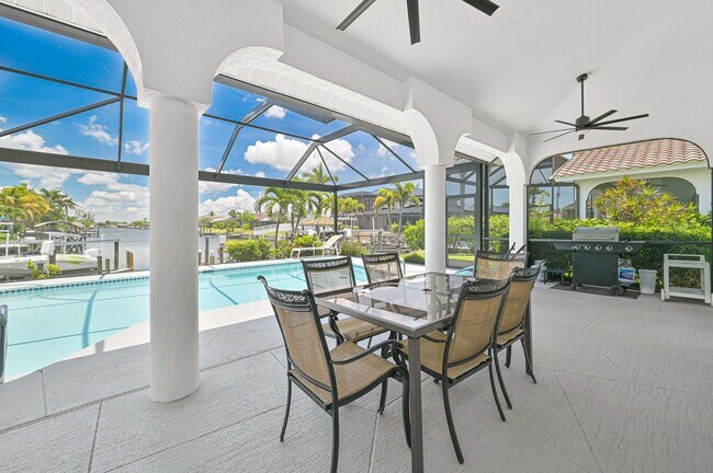 Building Photo - NOW AVAILABLE - Waterfront Pool Home w/ Bo...