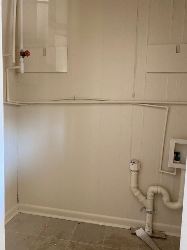 Building Photo - Upstairs, 3 bedroom and 2 bathroom unit on...