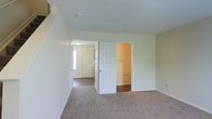 Located at 150 Reed Way in Sunburn, Ohio, this two-floor property offers a straightforward and functional design suited for comfortable everyday living. The interior features neutral, light-toned walls throughout, creating a bright and airy atmosphere that feels open and inviting. Soft carpeting covers the floors in the living areas, adding warmth and comfort underfoot. The layout is well-organized, with thoughtfully placed doorways that allow for a natural flow between spaces. A notable feature is the walk-in closet, providing generous storage space and easy organization. Adjacent rooms are connected through wide doorways, enhancing the sense of openness and accessibility. A window near the entryway allows natural light to filter through, brightening the interior. The textured ceilings add a subtle architectural detail consistent throughout the space. With its clean lines, ample storage, and practical layout spread across two floors, this property offers a solid and versatile living environment in a residential Sunburn, Ohio setting.