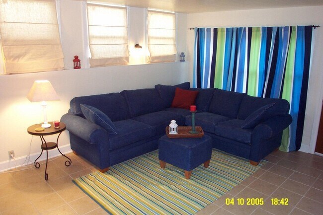 Living room. - 24606 University Ave