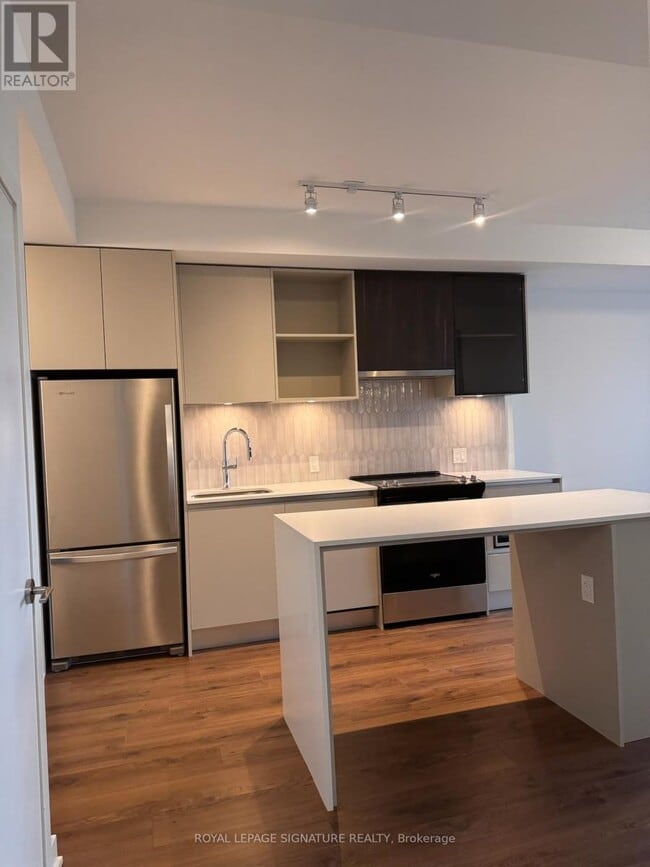 Photo du bâtiment - 395-395 Dundas St W