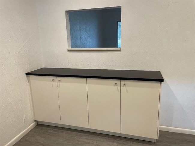 Building Photo - 6000 Grover Ave