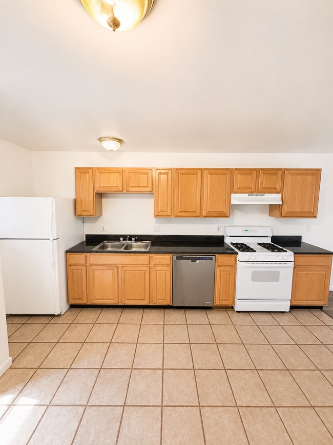 Photo - $1575 Moves You In - No Rent Due For August 2026    Updated interior - must see! Parking On Site ... Apartment
