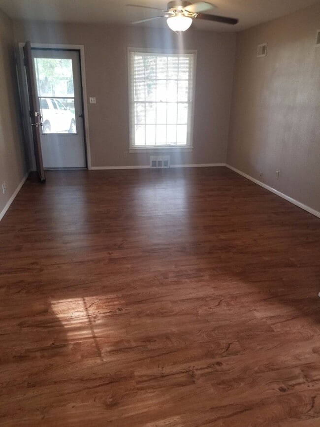 Building Photo - Backs to Open Space