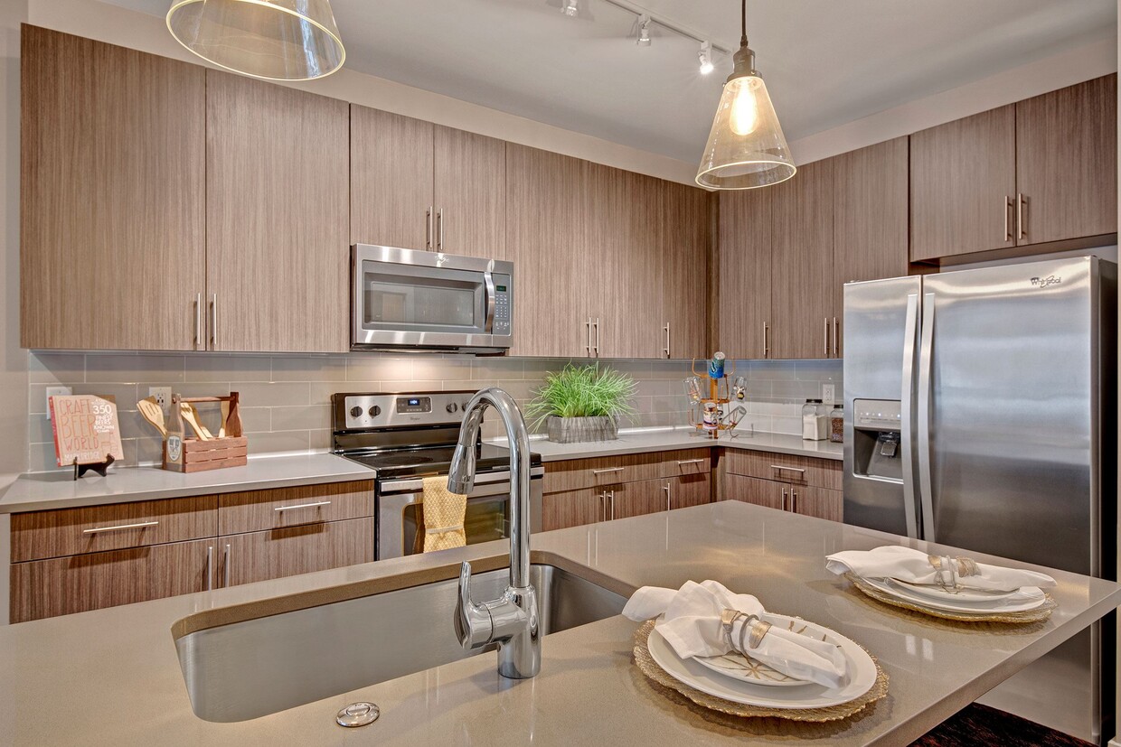 Stainless Appliances and Tile Backsplash - River House