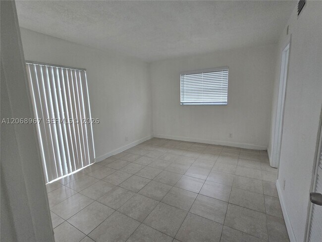 Building Photo - 8740 N Sherman Cir