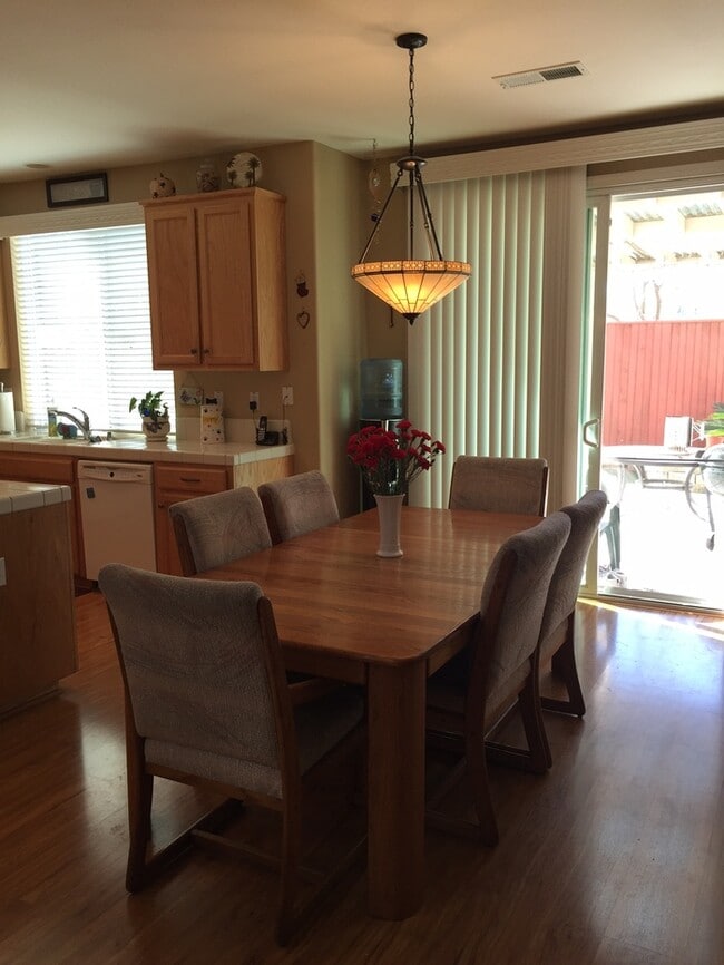 Building Photo - Spacious two-story home featuring 4 bedrooms and 3 full bathrooms (1 bedroom and 1 bathroom downs...
