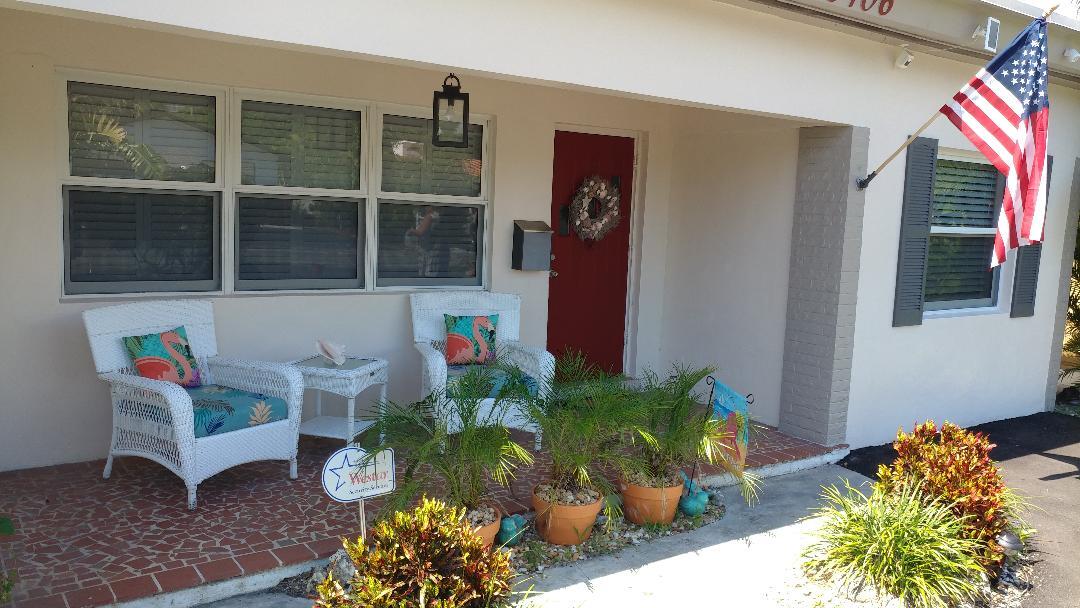 Front Porch with Flag - 3406 Norfolk St